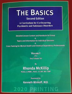 The basics book cover on the display of the website